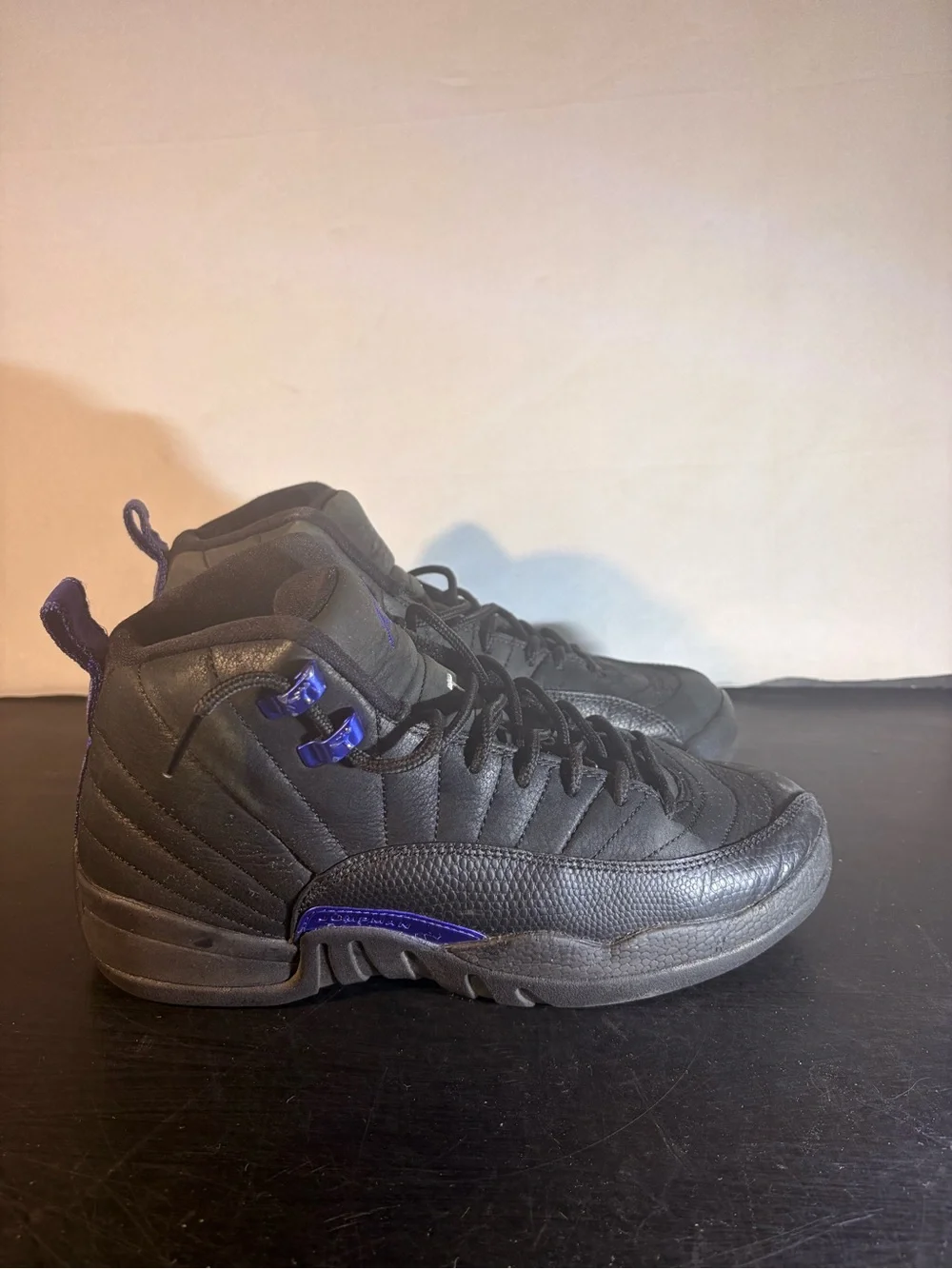 Men's Jordan 11 Black High-Top Athletic Sneakers with Purple Accents
